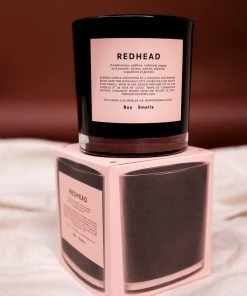 BOY SMELLS NEW IN REDHEAD CANDLE